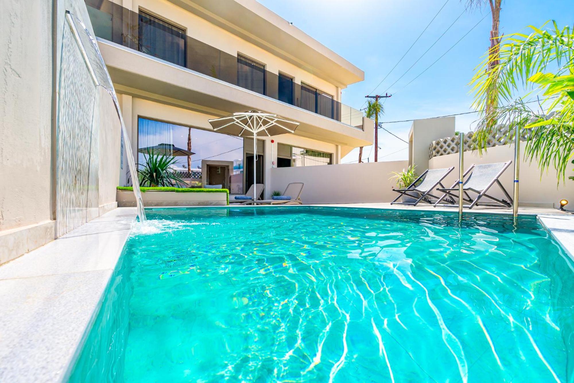 Pathos Seaside Suites Фаліракі Номер фото
